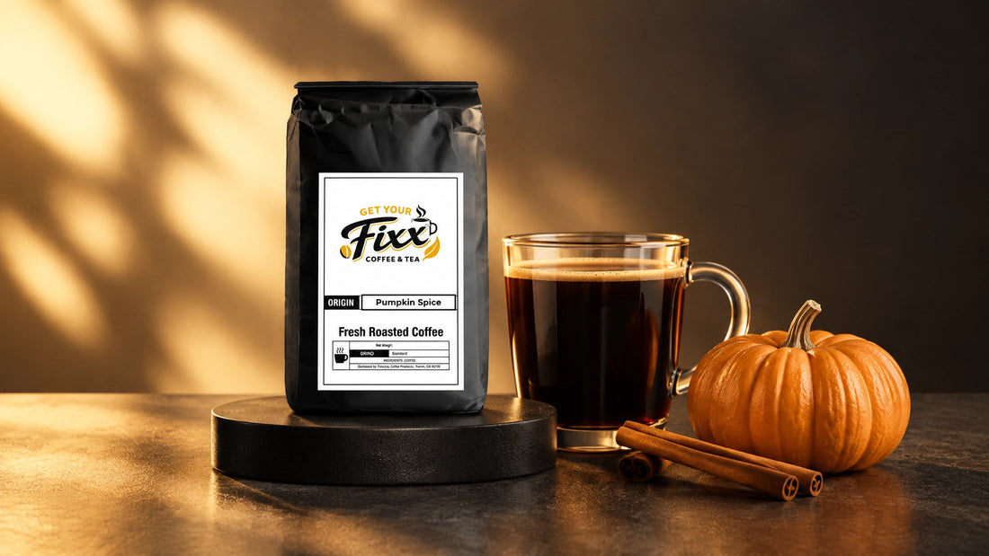 Stage-lit autumn still life with a Pumpkin Spice coffee bag, dark coffee, cinnamon sticks, and a small pumpkin